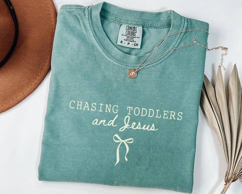 The "Chasing Toddlers & Jesus" Everyday Tee -  Christian Mom Shirt with Coquette Bow Detail