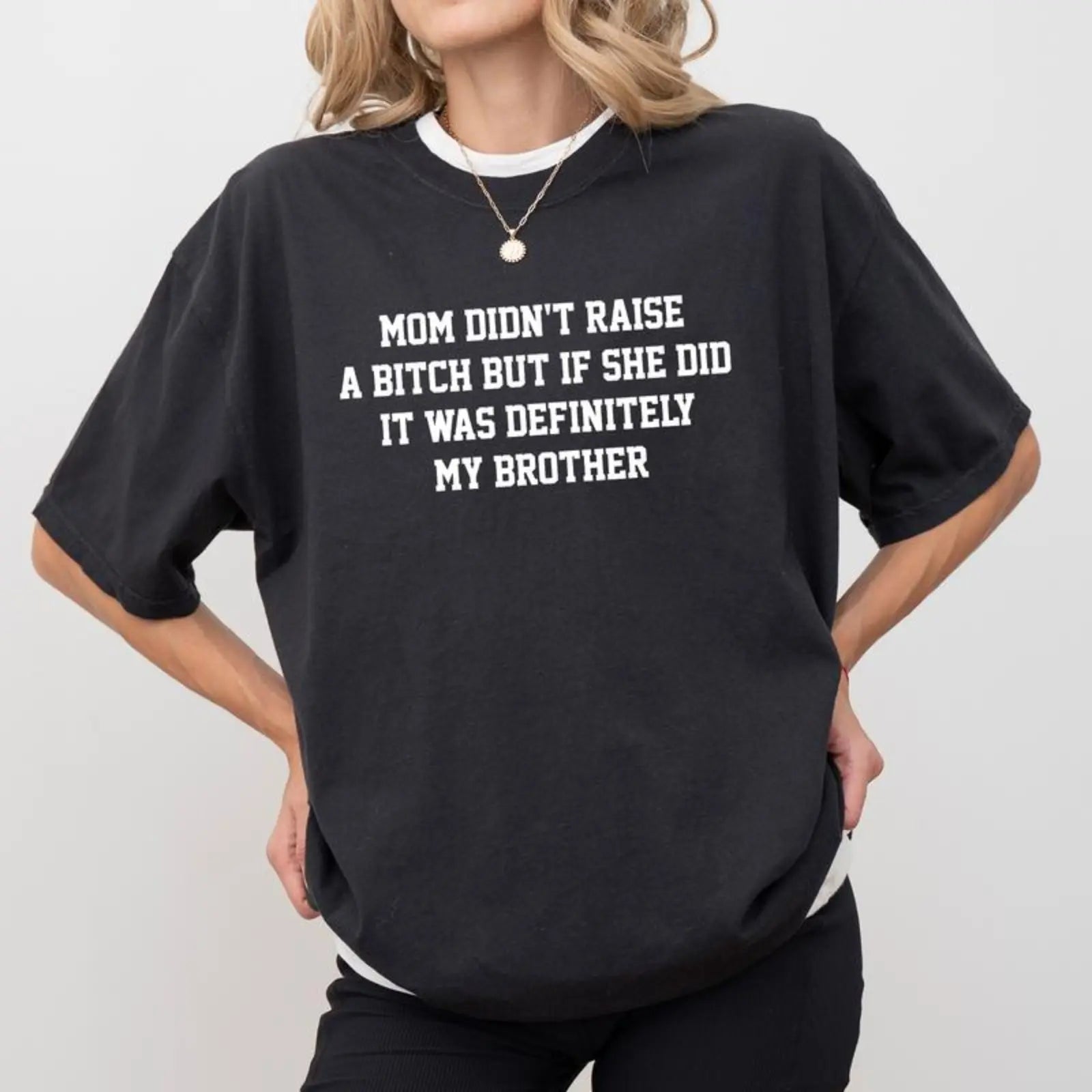 MadFits Black Mom Didn't Raise A B*tch Funny Sibling Tee Lifestyle Front View