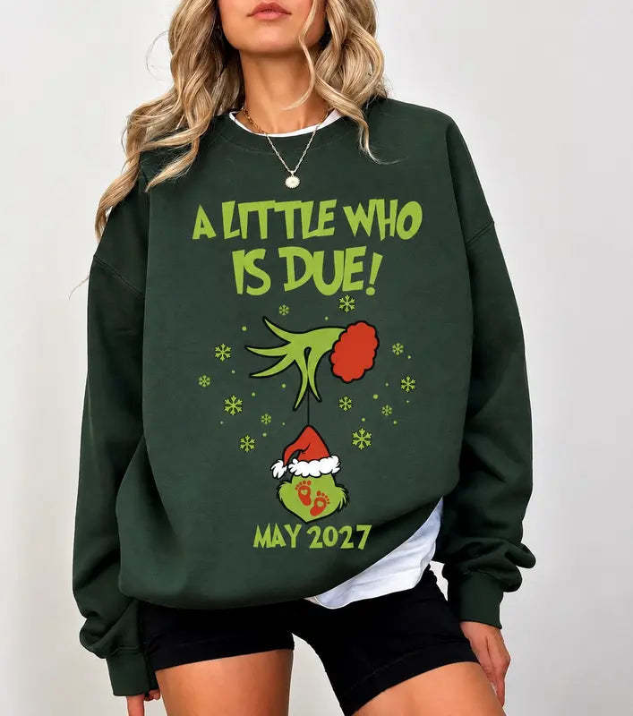 Funny Christmas Pregnancy Announcement Sweatshirt for Moms-To-Be Due May 2027 Reveal