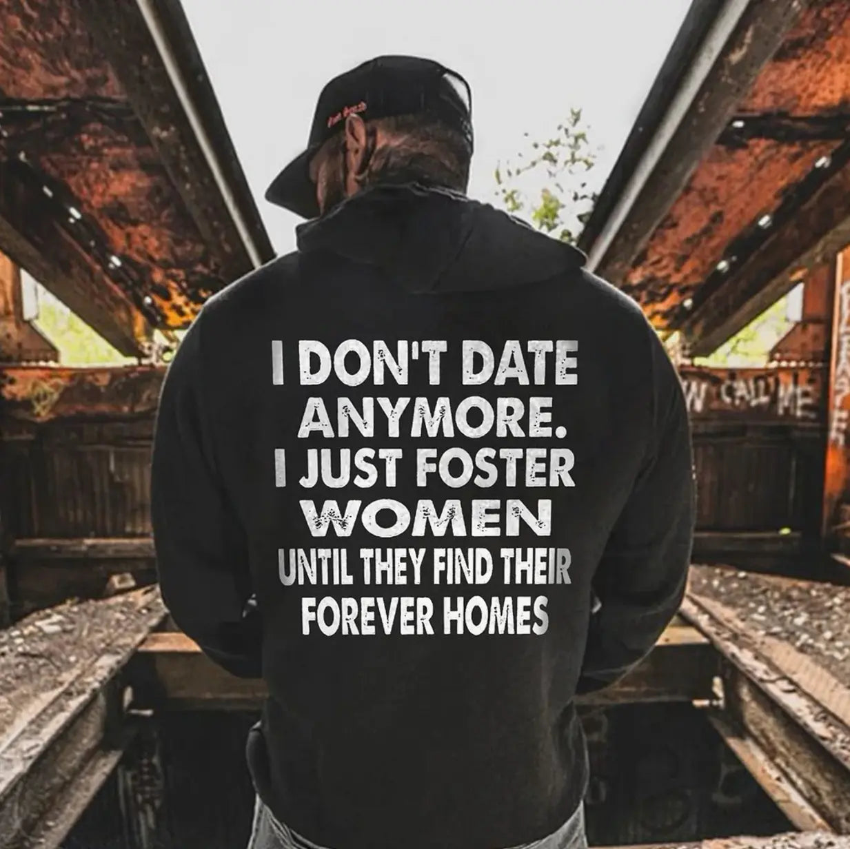 MadFits Black Heartbreak Shelter Hoodie Back View Industrial Lifestyle Shot