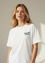 MadFits White Love Yourz Tee Front View Female Model Lifestyle Fit